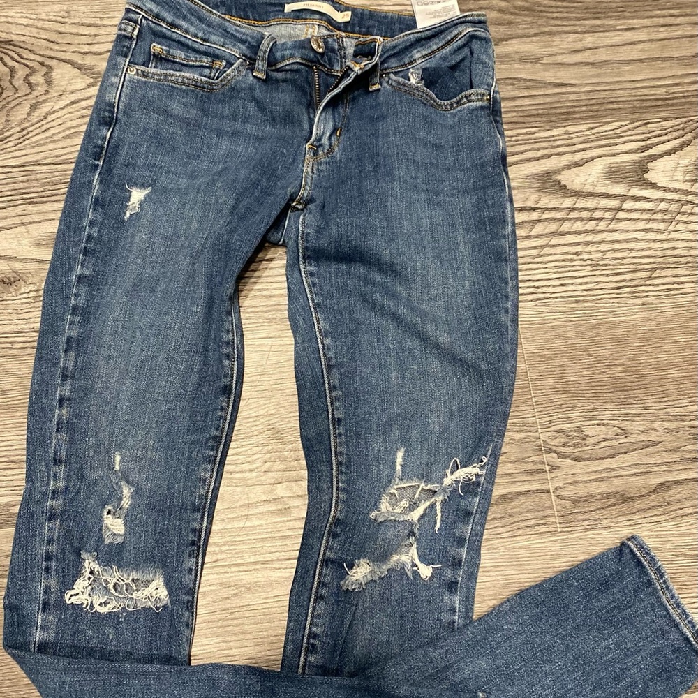 Size 25 Dark wash distressed levi jeans